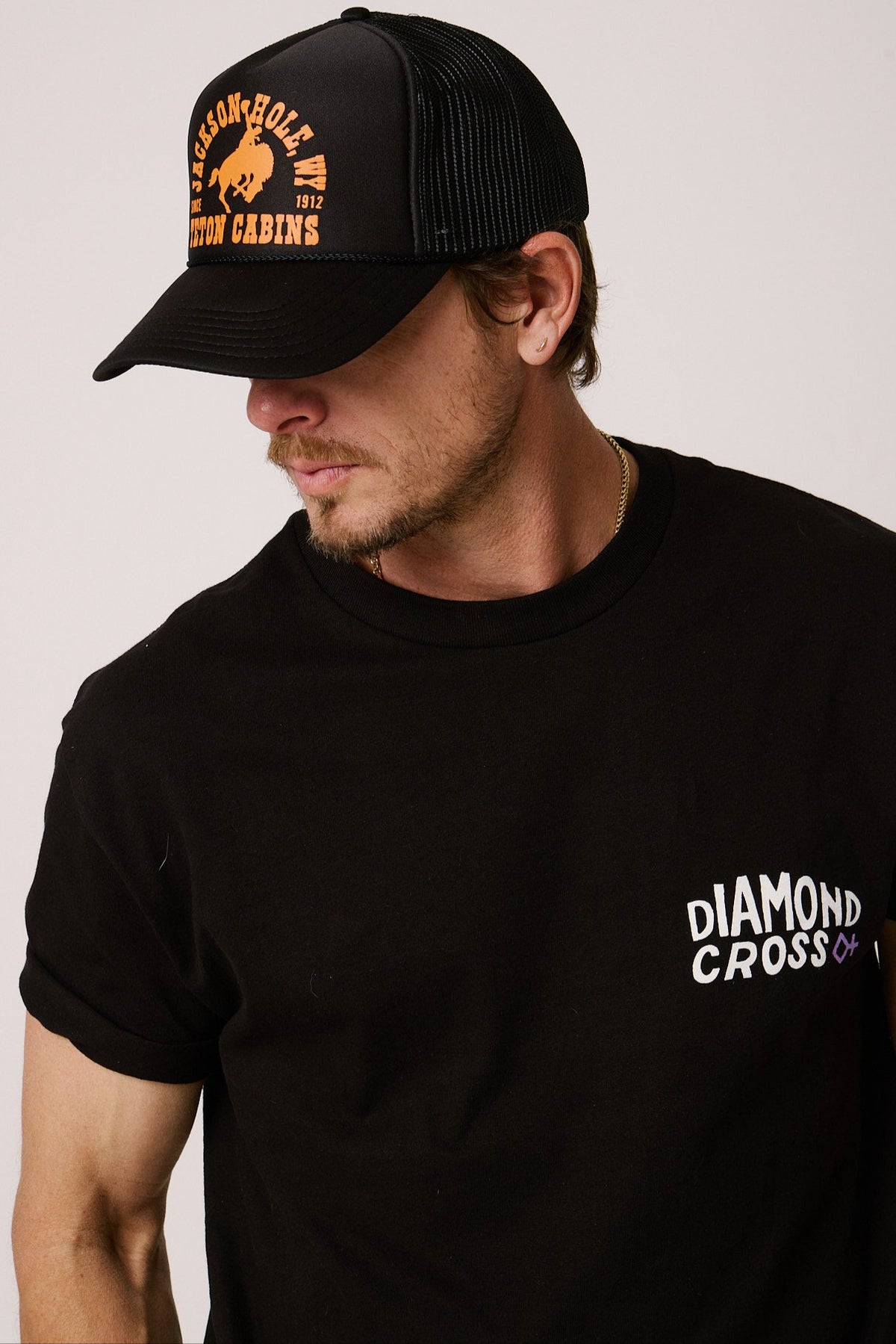 Black + Orange | Diamond cross ranch Buckin Trucker cap
