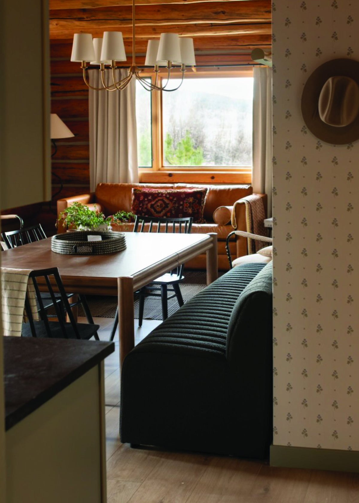 Dining table and living room in the Two Bedroom Luxury cabin