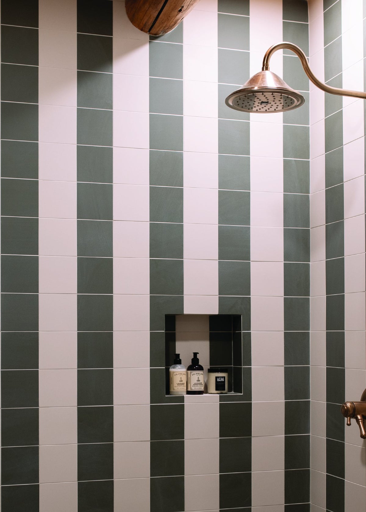 Striped tile shower in the Two Bedroom Luxury cabin