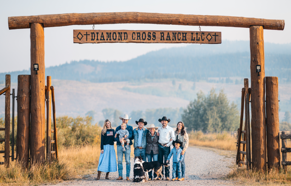 Diamond Cross Ranch family at the ranch gate