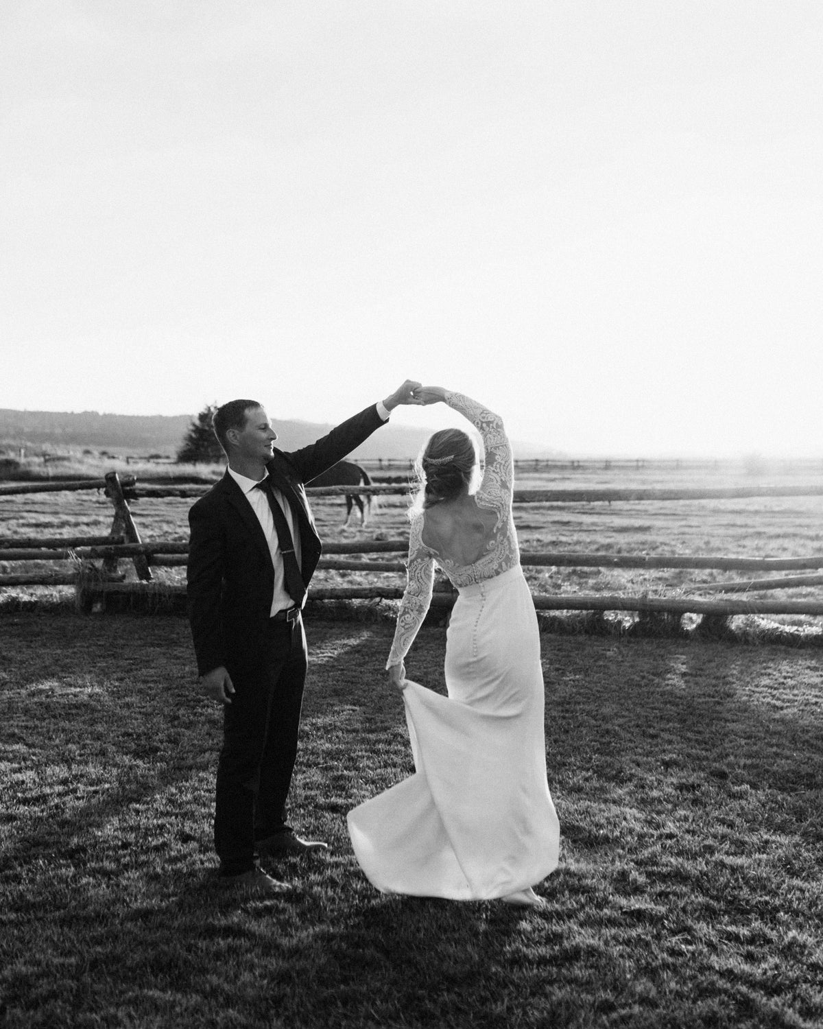 Couple dancing in the field at Diamond Cross Ranch